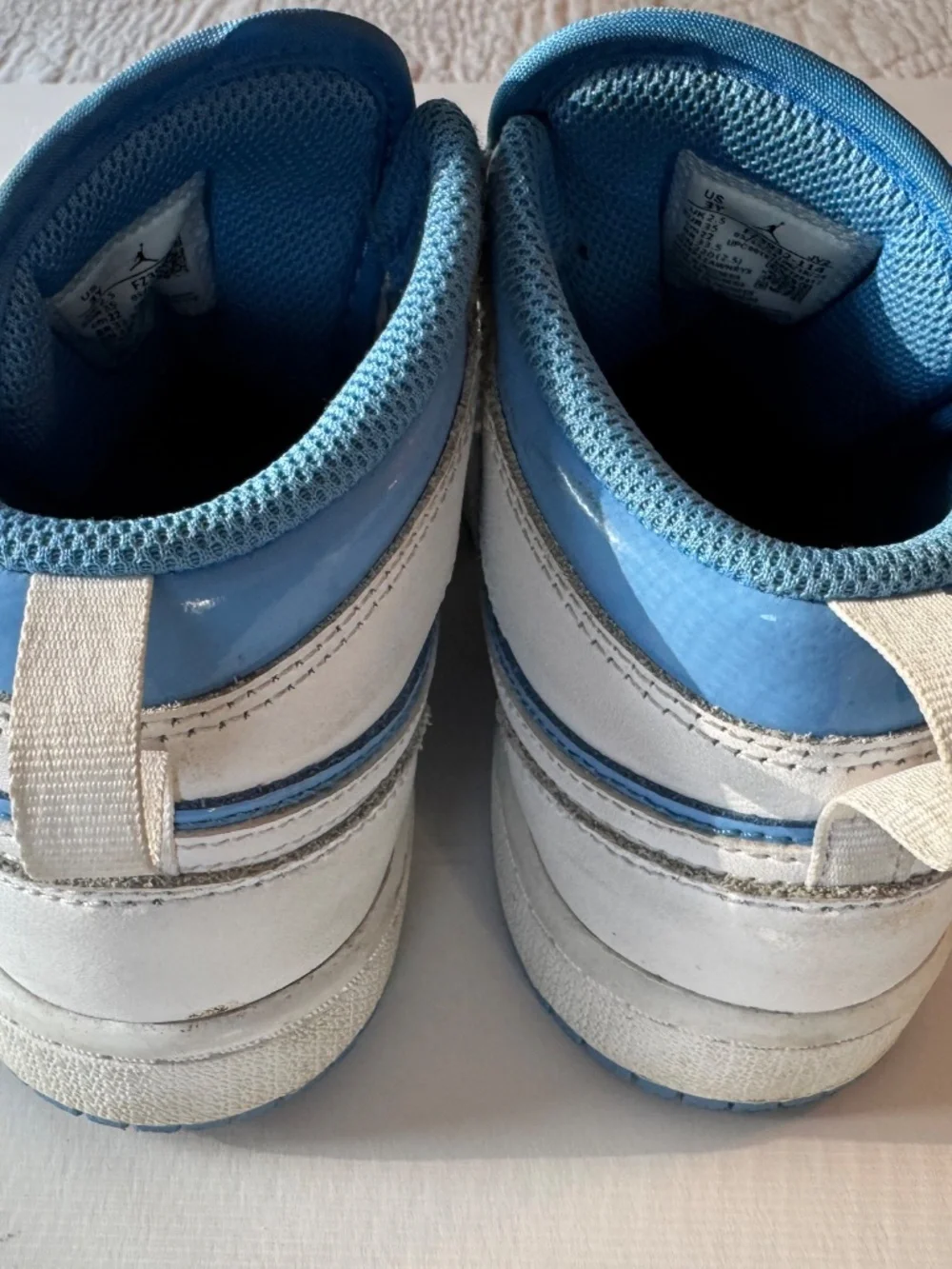 Air Jordan I Mid Youth size 3Y. Light blue and white.
